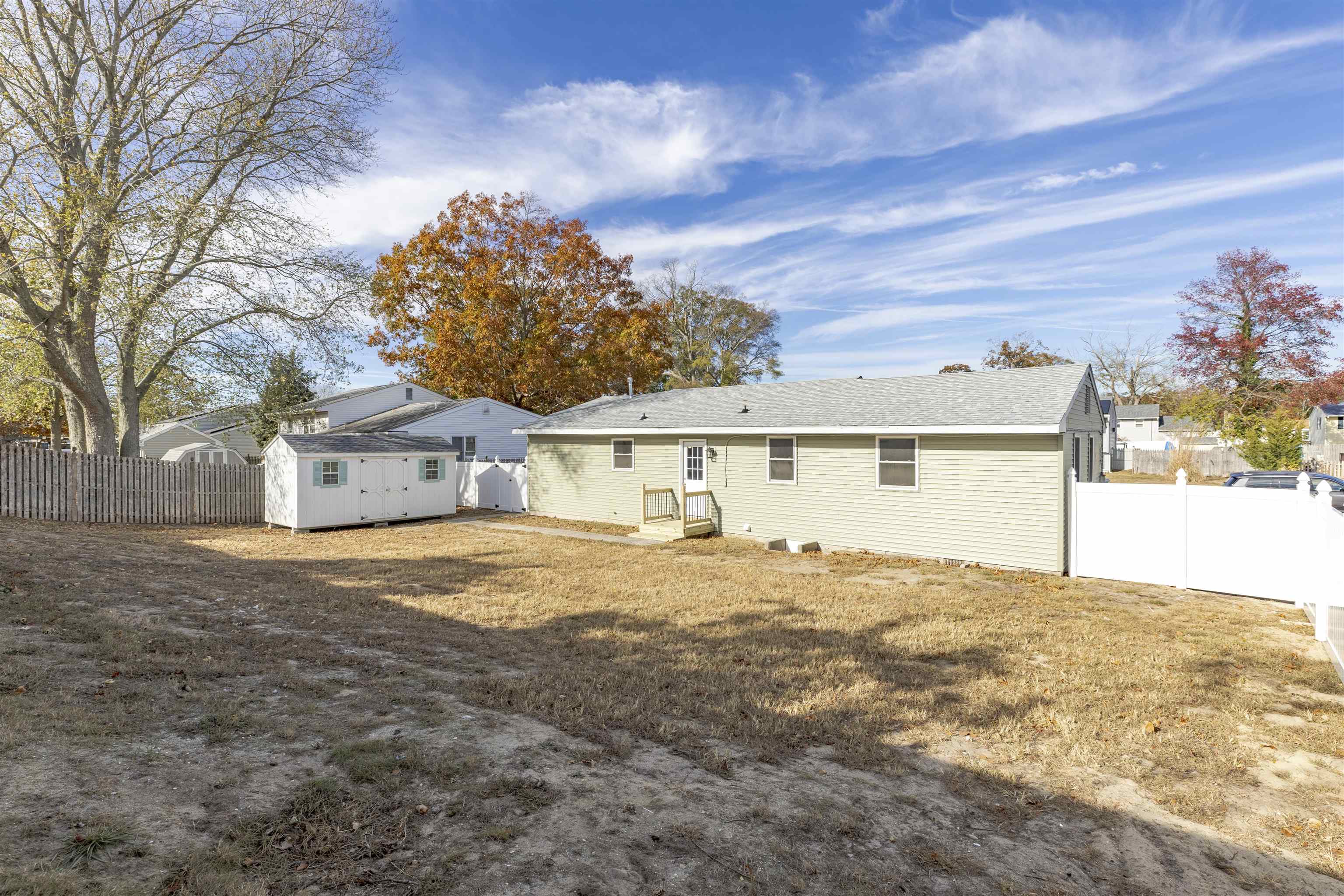 116 Orchard Drive North Cape May, NJ 08204 - Photo 24 of 32 a view of a house with a yard and garage