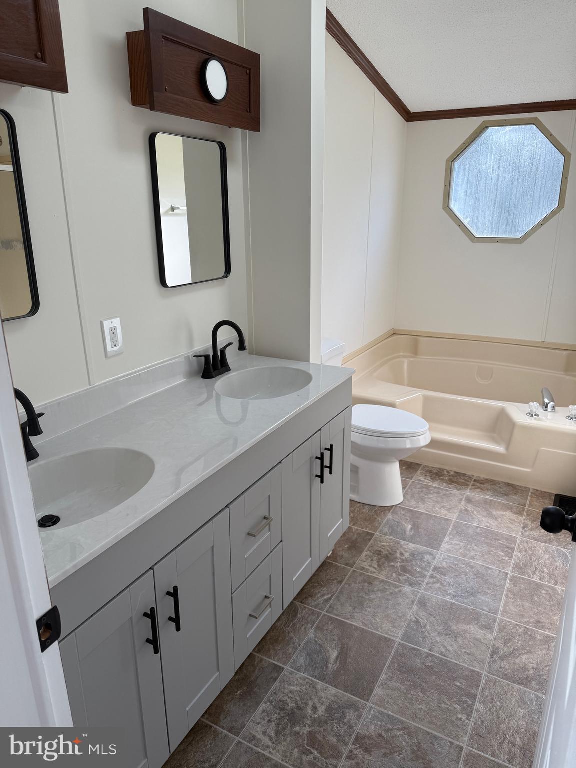 300 Brook Road Atglen, PA 19310 - Photo 18 of 42 a bathroom with a sink a toilet and mirror