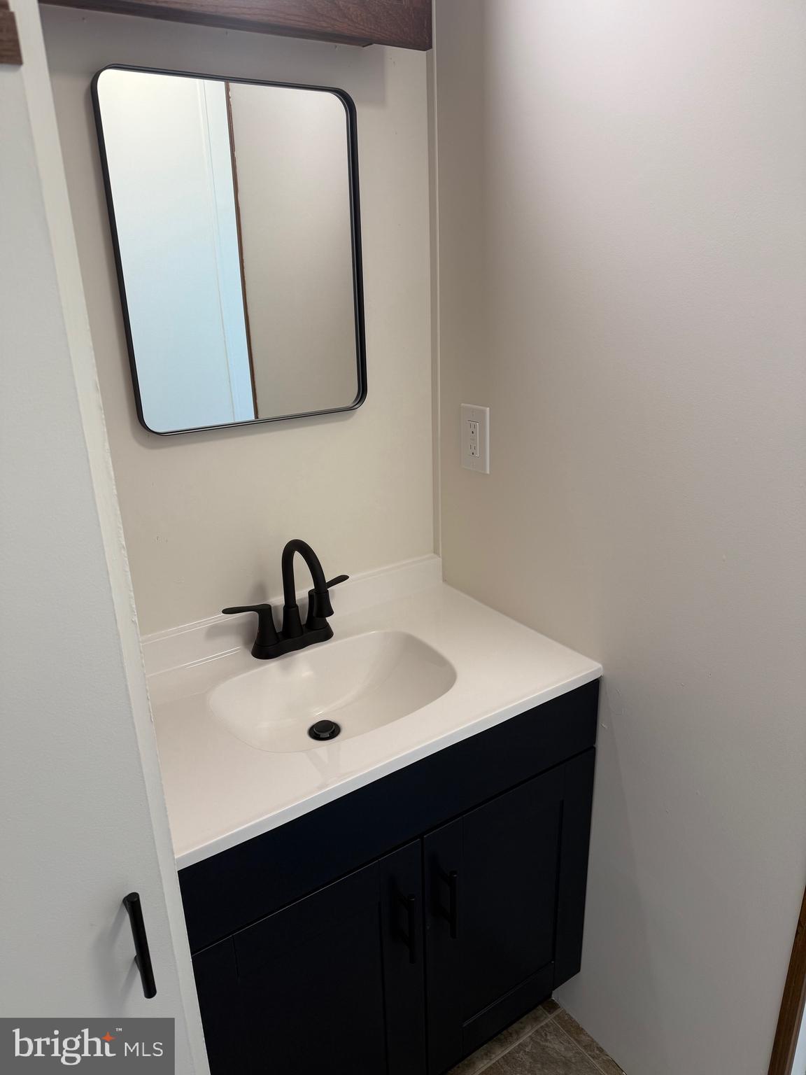 300 Brook Road Atglen, PA 19310 - Photo 23 of 42 a bathroom with a sink and a mirror