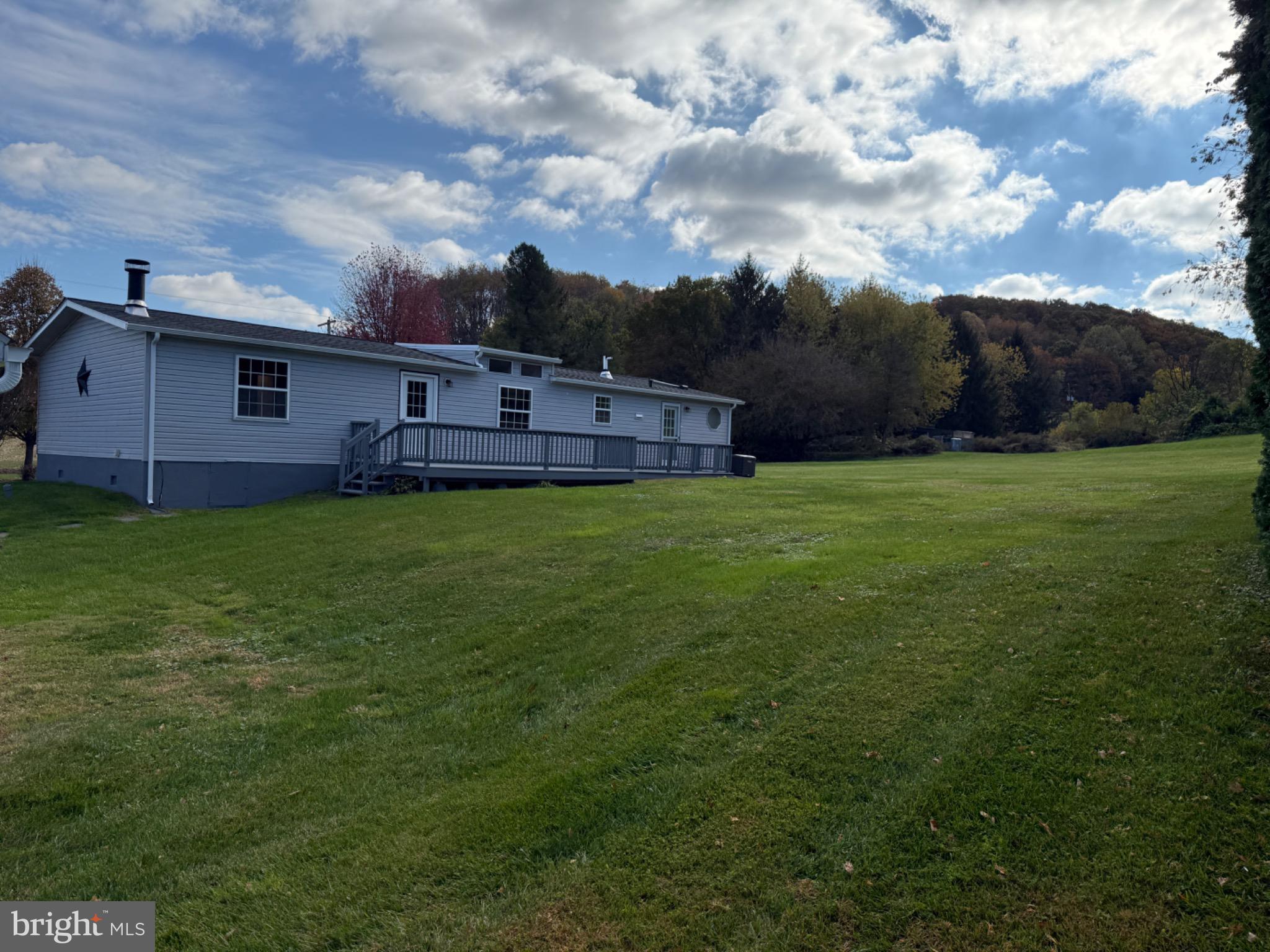 300 Brook Road Atglen, PA 19310 - Photo 27 of 42 a backyard of a house with lots of green space