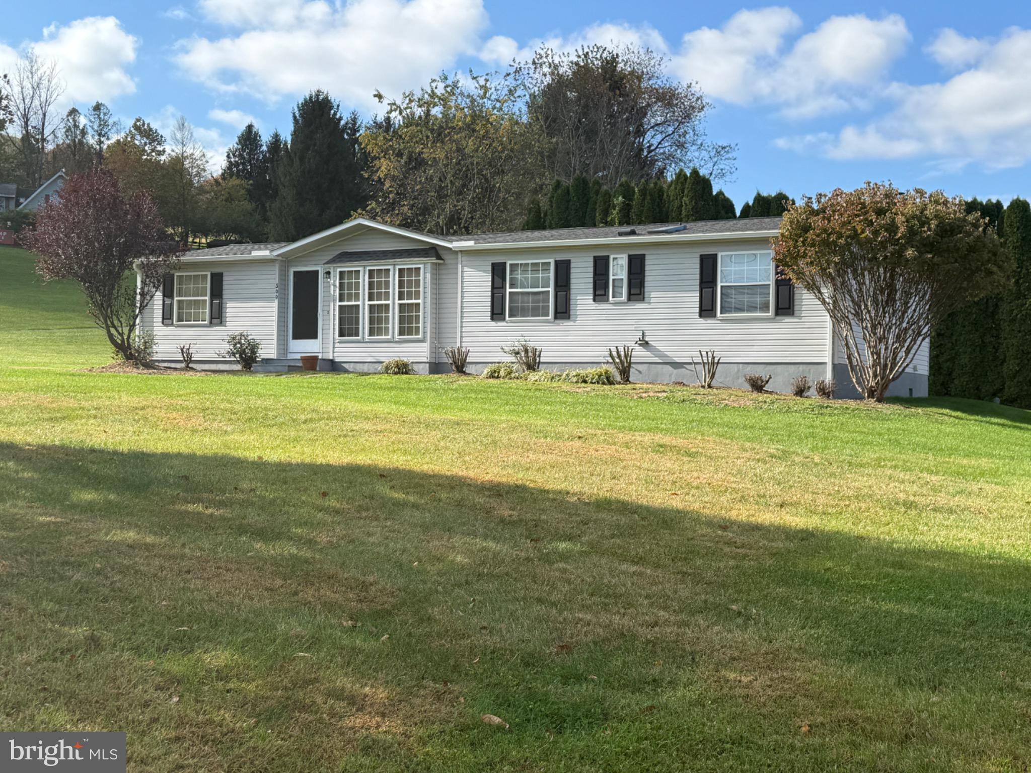 300 Brook Road Atglen, PA 19310 - Photo 33 of 42 a front view of a house with a garden