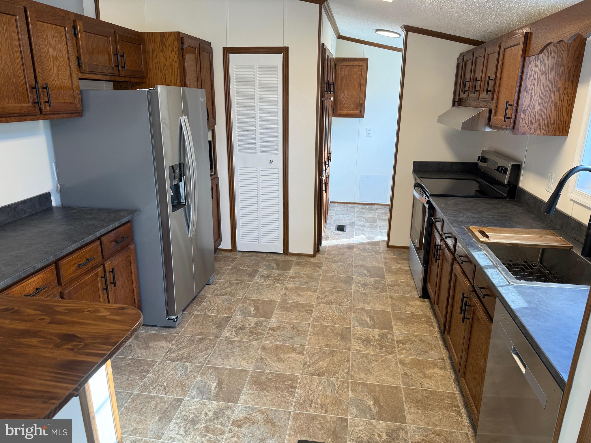 300 Brook Road Atglen, PA 19310 - Photo 4 of 42 a kitchen with stainless steel appliances granite countertop a refrigerator and a stove