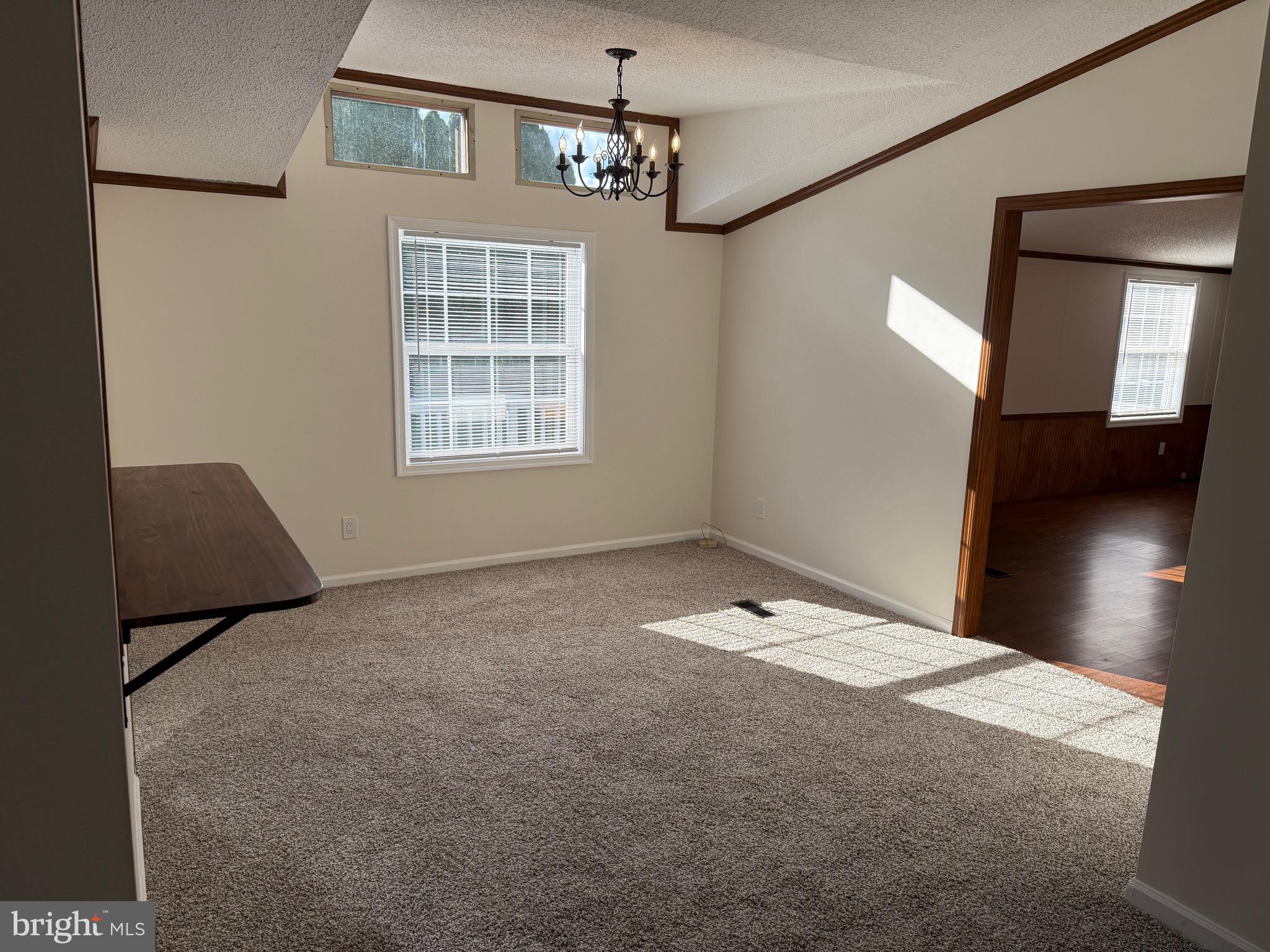 300 Brook Road Atglen, PA 19310 - Photo 10 of 42 a view of a bedroom with a bed and a chandelier