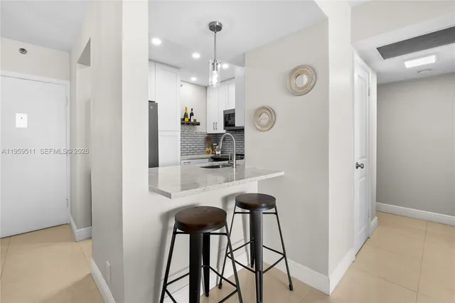 a bathroom with a mirror and a shower
