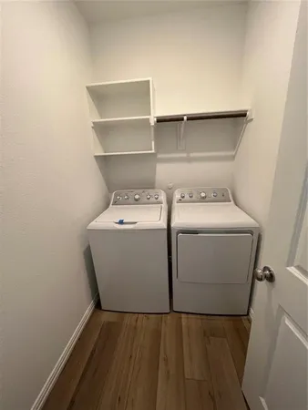 a utility room with dryer and washer