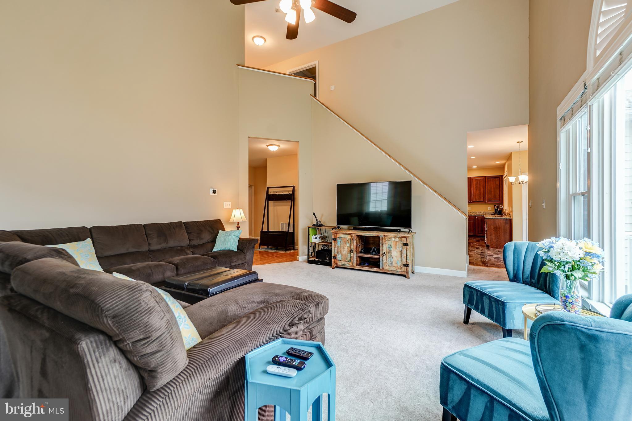 12108 Damson Drive North Potomac, MD 20878 - Photo 14 of 47 Light- Filled Two-Story Family Room with Fireplace