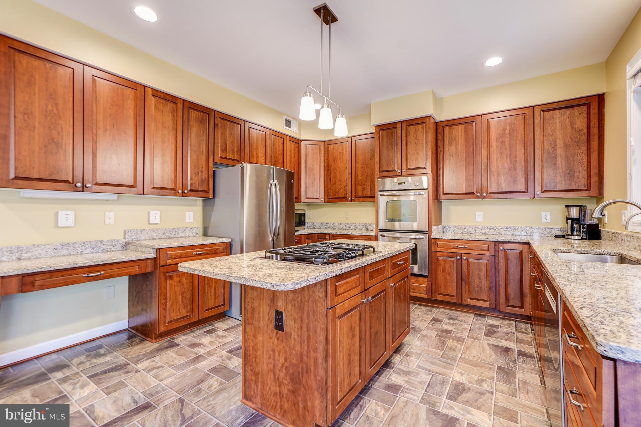 12108 Damson Drive North Potomac, MD 20878 - Photo 16 of 47 42" Upgraded Cabinets, French Door Fridge