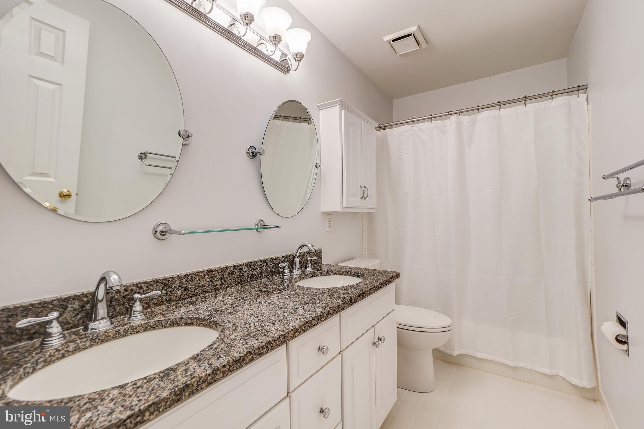 12108 Damson Drive North Potomac, MD 20878 - Photo 36 of 47 Hall Bath with Dual Vanity and Granite