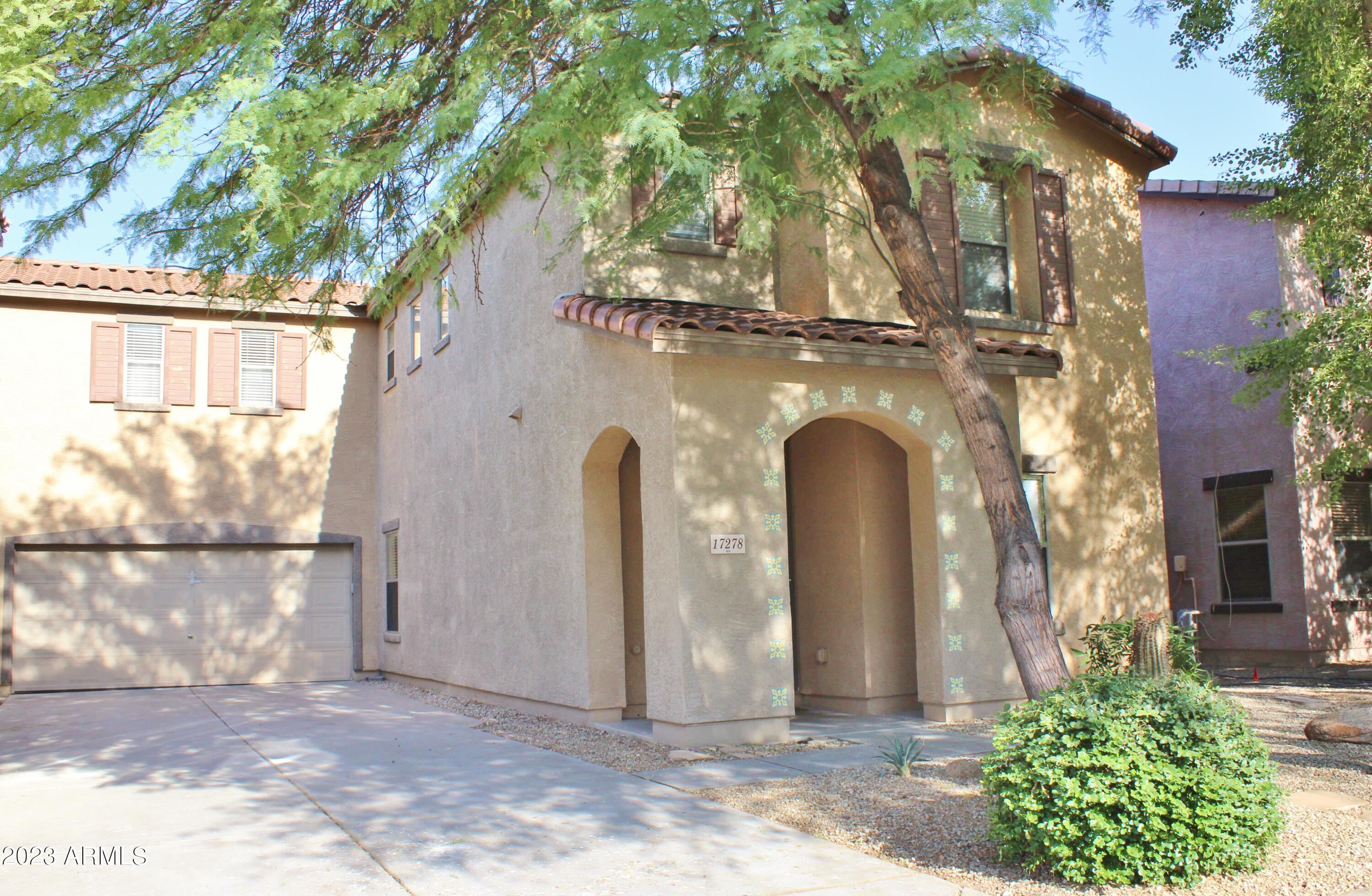 17278 North 184th Drive Surprise, AZ 85374 - Photo 2 of 32 a view of a house with a yard
