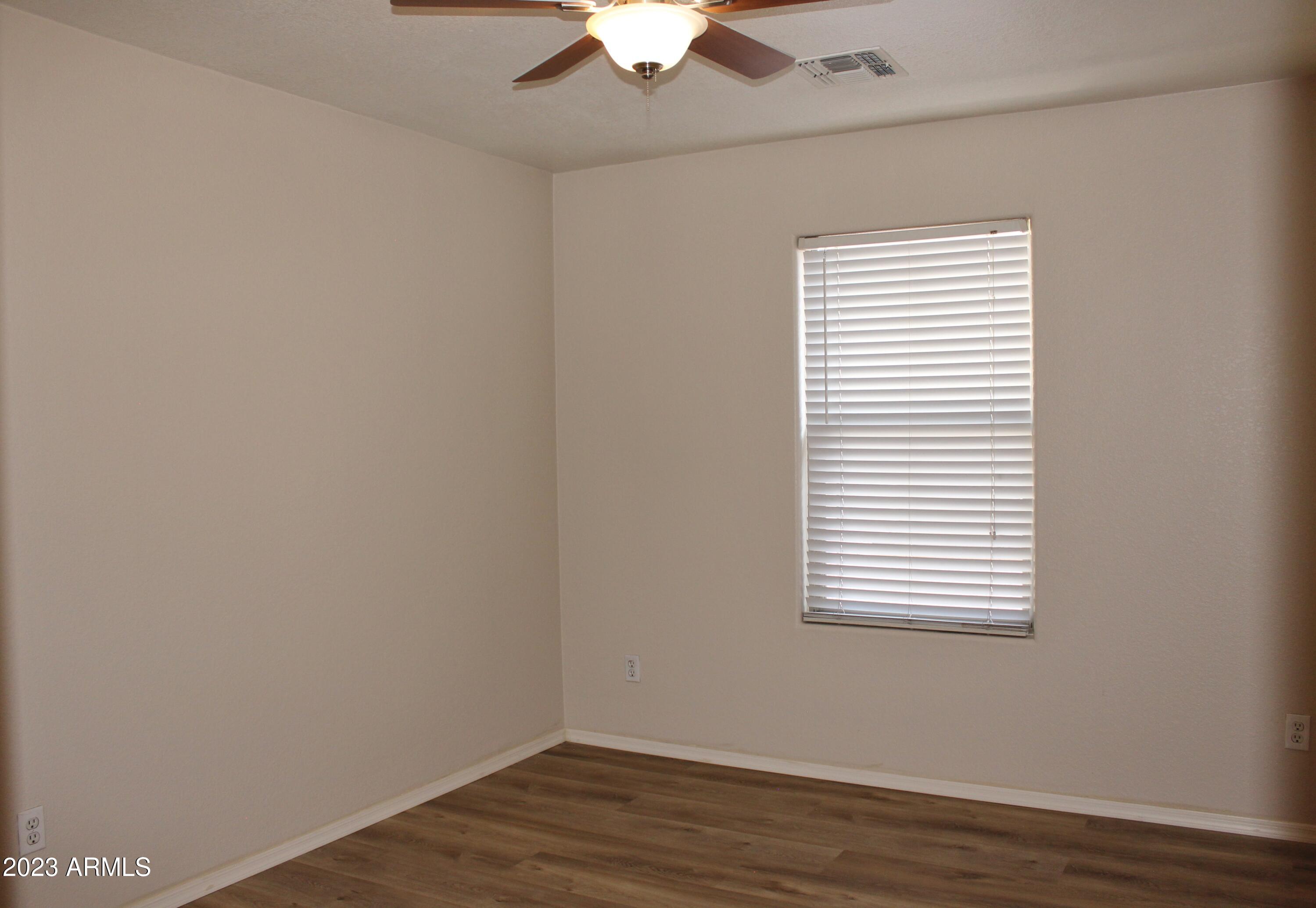17278 North 184th Drive Surprise, AZ 85374 - Photo 24 of 32 a view of a room that has a window in it