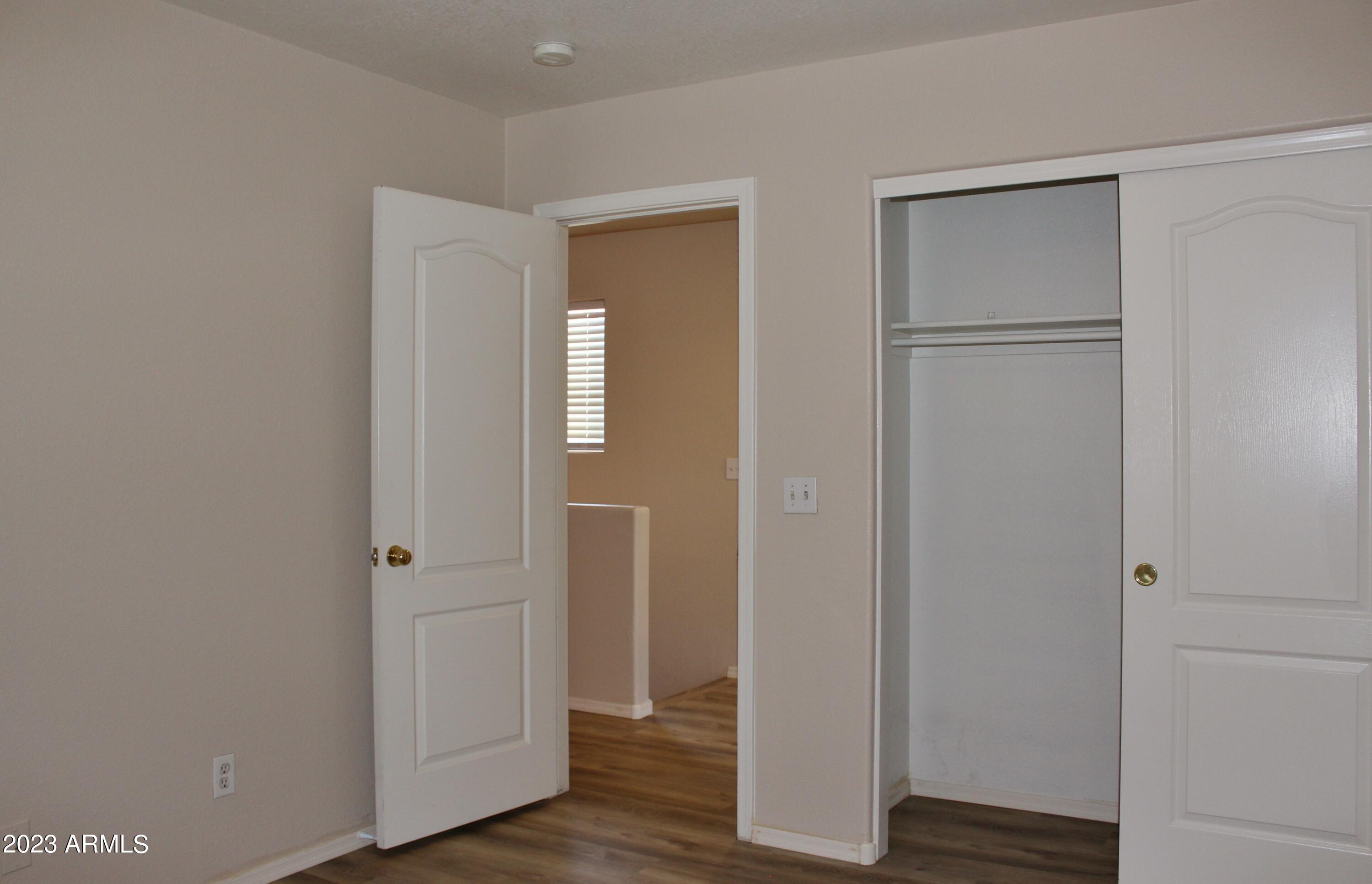 17278 North 184th Drive Surprise, AZ 85374 - Photo 25 of 32 a view of room with wooden floor