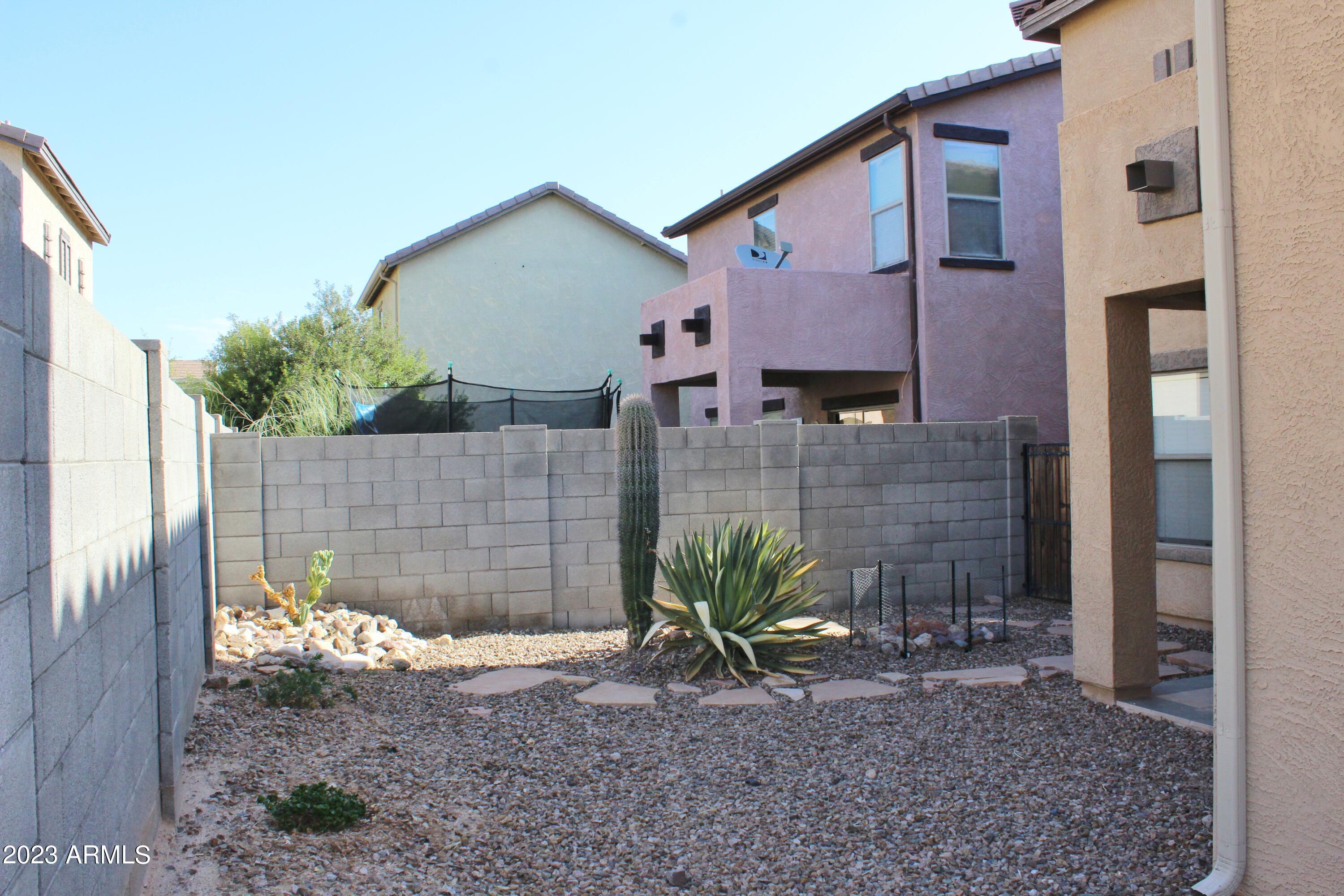 17278 North 184th Drive Surprise, AZ 85374 - Photo 32 of 32 a view of a house with a yard and plants