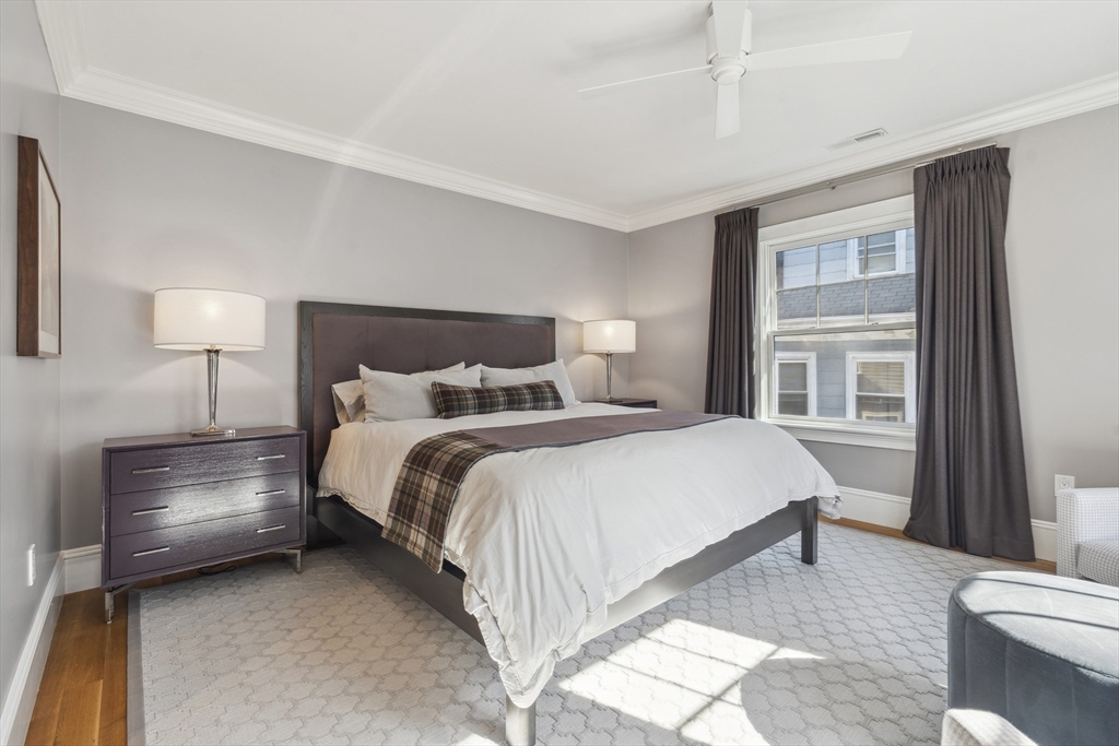 73 Upland Road Cambridge, MA 02140 - Photo 21 of 42 a bedroom with a bed and a large window