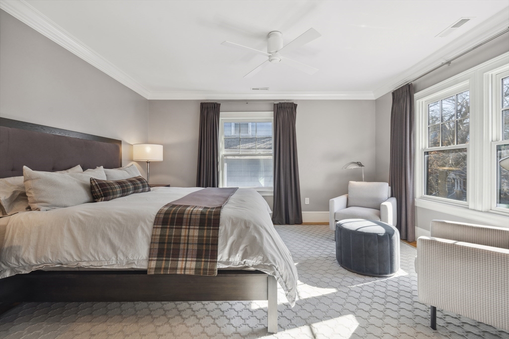 73 Upland Road Cambridge, MA 02140 - Photo 22 of 42 a bedroom with bed and a large window