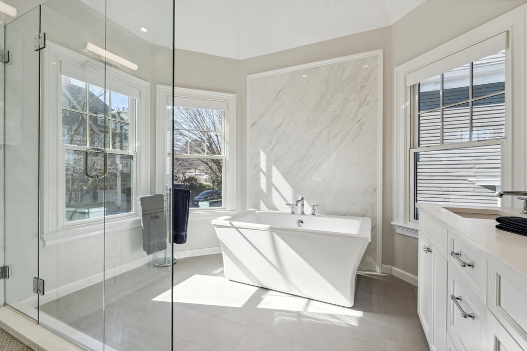 73 Upland Road Cambridge, MA 02140 - Photo 24 of 42 a bathroom with a bathtub and a sink