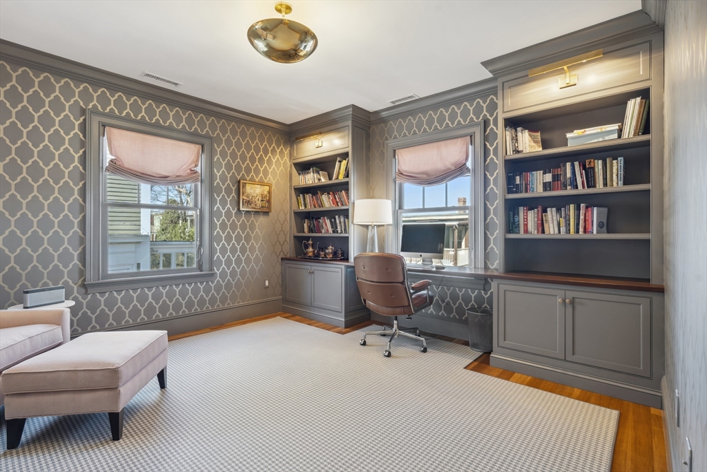 73 Upland Road Cambridge, MA 02140 - Photo 27 of 42 a workspace with furniture and a window