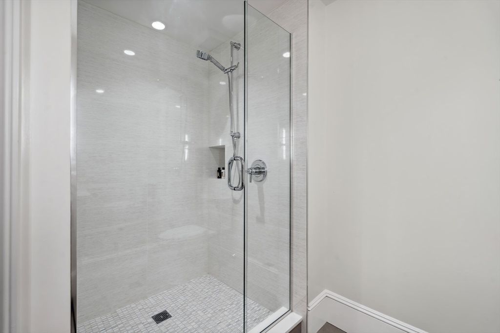 73 Upland Road Cambridge, MA 02140 - Photo 36 of 42 a bathroom with a shower
