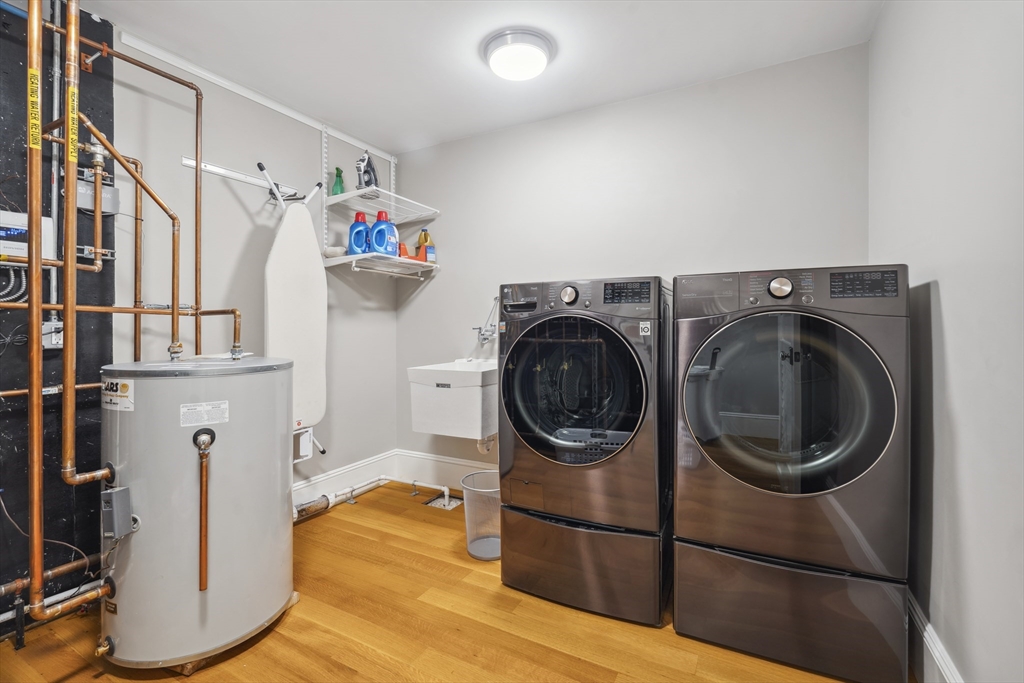 73 Upland Road Cambridge, MA 02140 - Photo 38 of 42 a utility room with dryer and washer