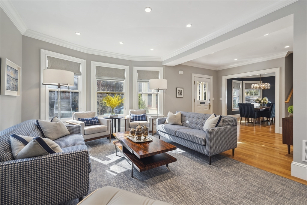 73 Upland Road Cambridge, MA 02140 - Photo 4 of 42 a living room with furniture and a large window