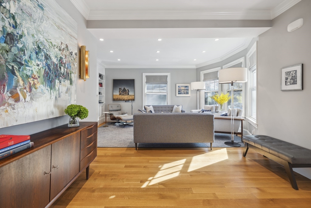 73 Upland Road Cambridge, MA 02140 - Photo 9 of 42 a living room with furniture and a flat screen tv