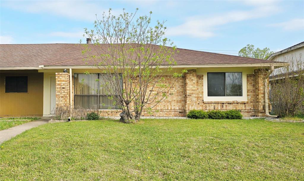 2224 Limestone Lane Garland, TX 75040 - Photo 1 of 16 a view of a house with a yard