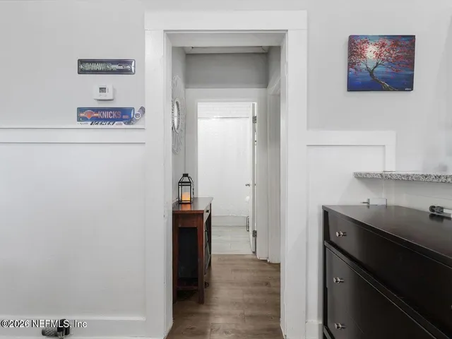 a area with cabinets and a wooden floor
