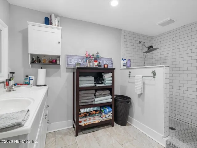 a bathroom with a toilet and a sink