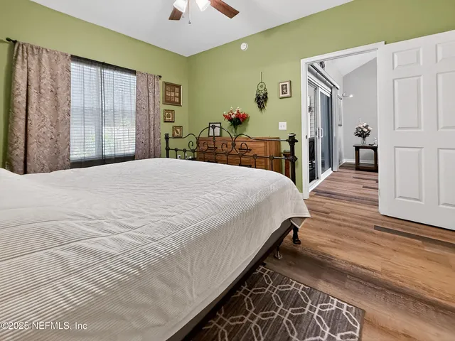 a bed room with a bed and a dresser