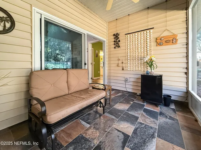 a view of a yard with large trees