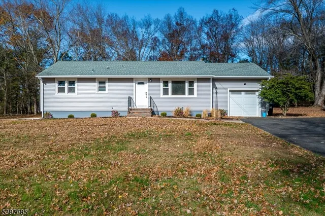 front view of a house with a dry yard