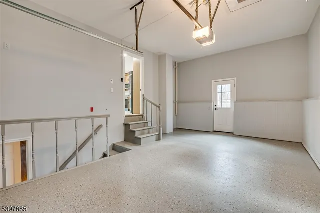 a view of a livingroom with a staircase