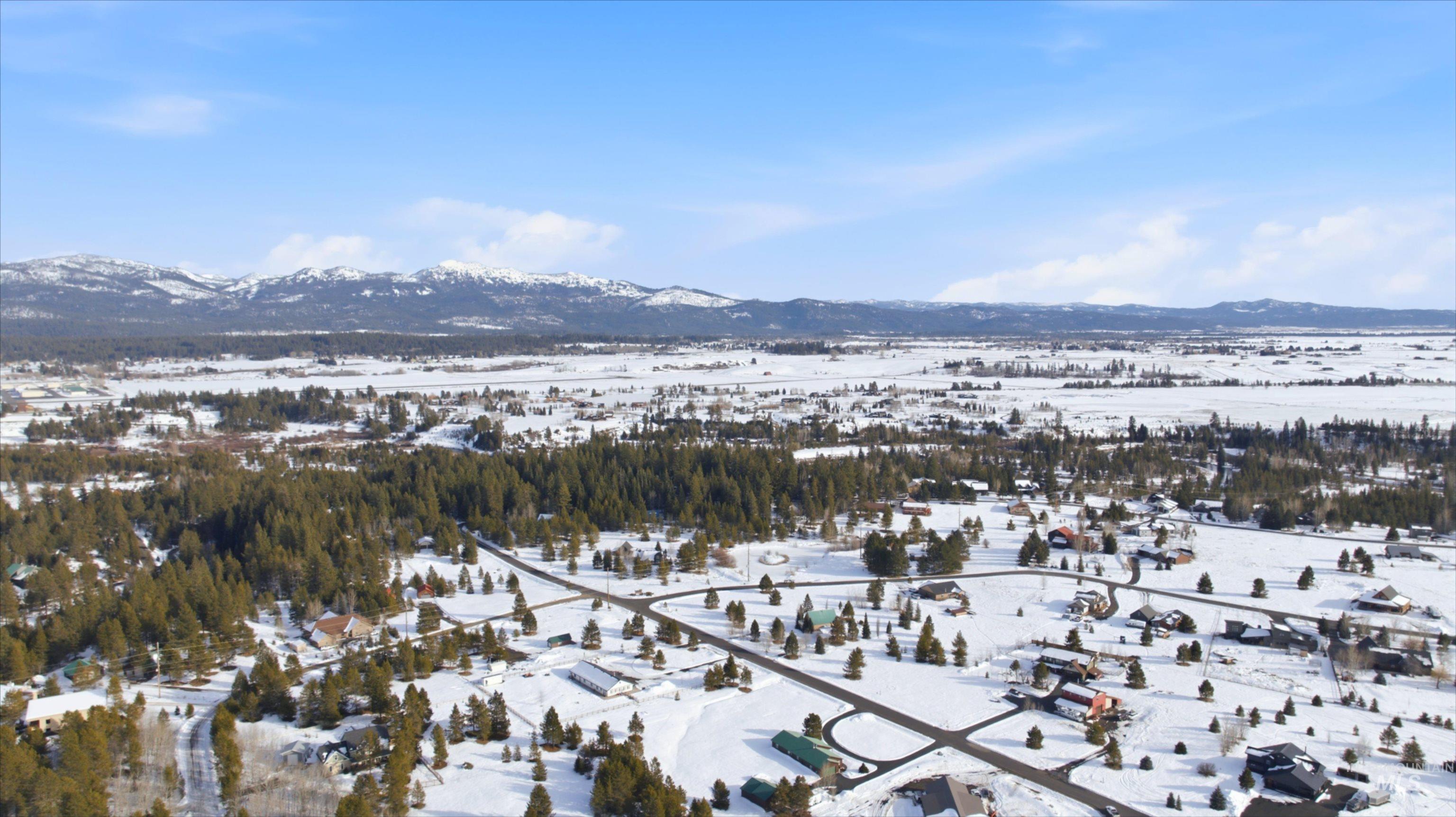 969 Valley View Lane McCall, ID 83638 - Photo 10 of 13 Snowy aerial view with a mountain view