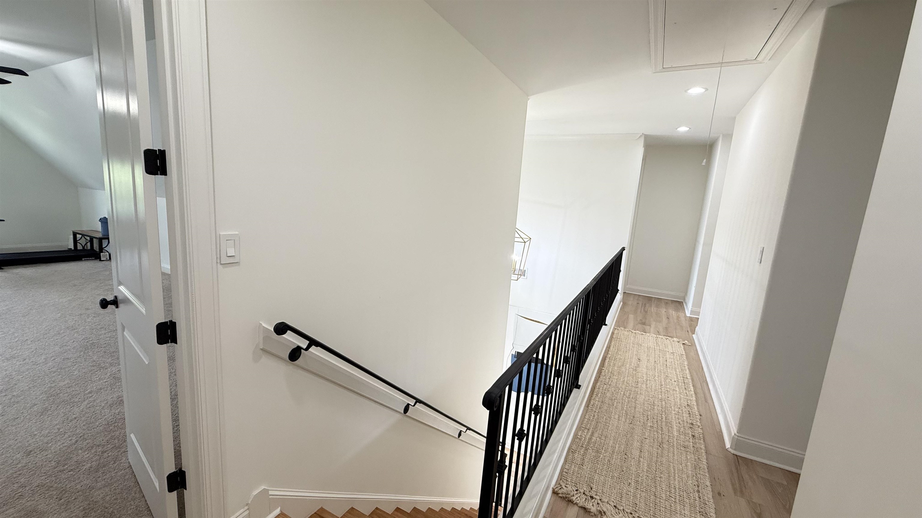 1746 Chadwick Farms Loop North Collierville, TN 38017 - Photo 20 of 35 Hallway featuring an upstairs landing, attic access, recessed lighting, and light carpet