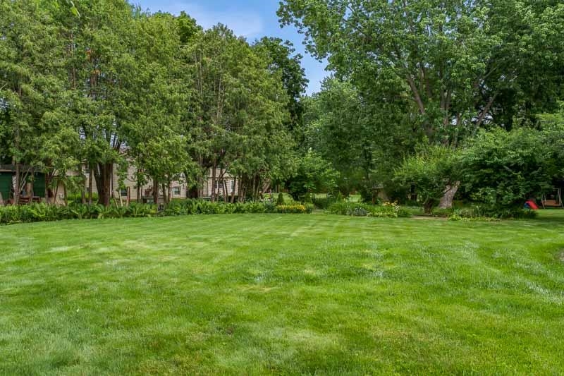 5792 Haddon Place Rockford, IL 61114 - Photo 45 of 47 a view of green field with trees in the background