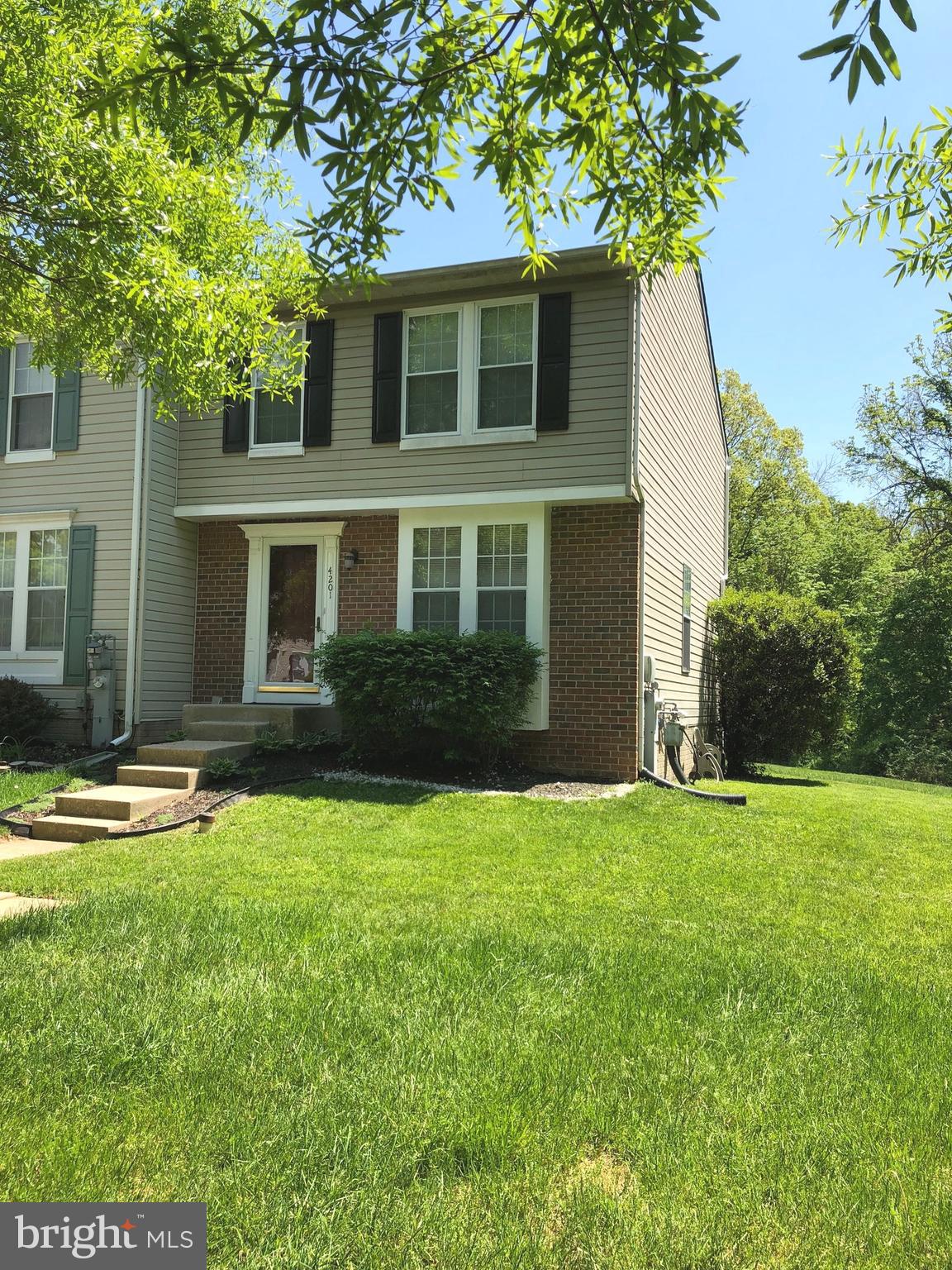 4201 Red Haven Road Baltimore, MD 21208 - Photo 1 of 29 front view of a house with a yard