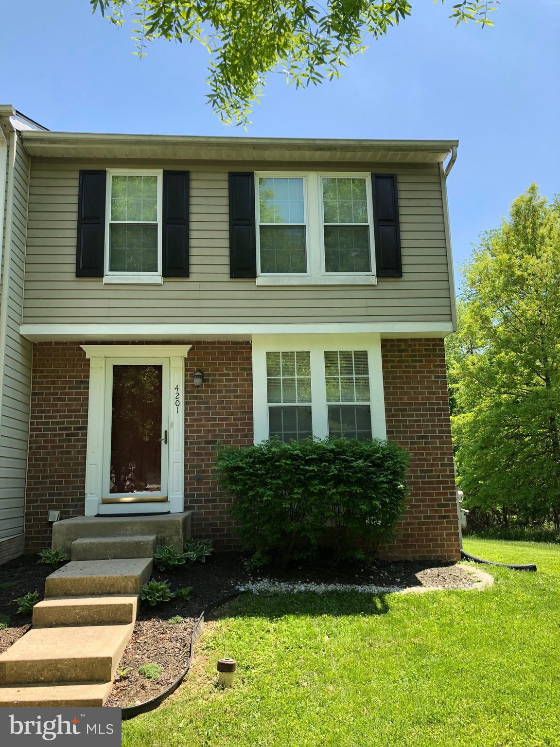 4201 Red Haven Road Baltimore, MD 21208 - Photo 2 of 29 a front view of a house with garden