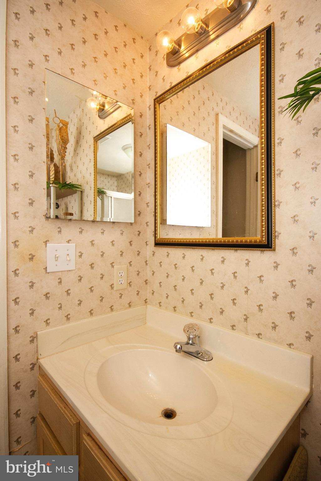 4201 Red Haven Road Baltimore, MD 21208 - Photo 20 of 29 a bathroom with a sink and a bathtub