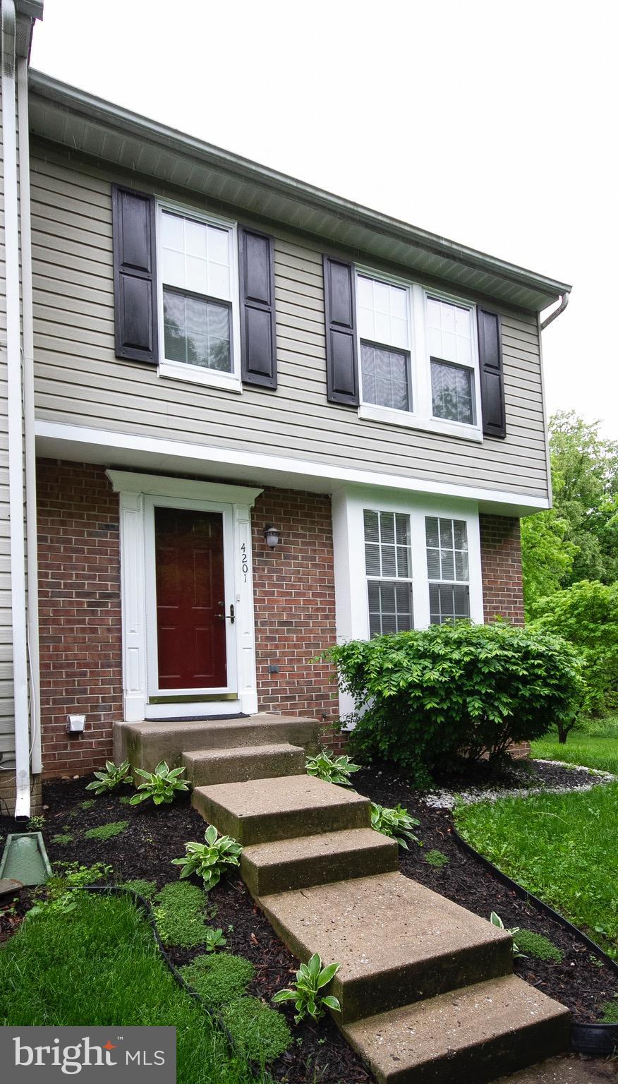 4201 Red Haven Road Baltimore, MD 21208 - Photo 3 of 29 front view of a house with a yard