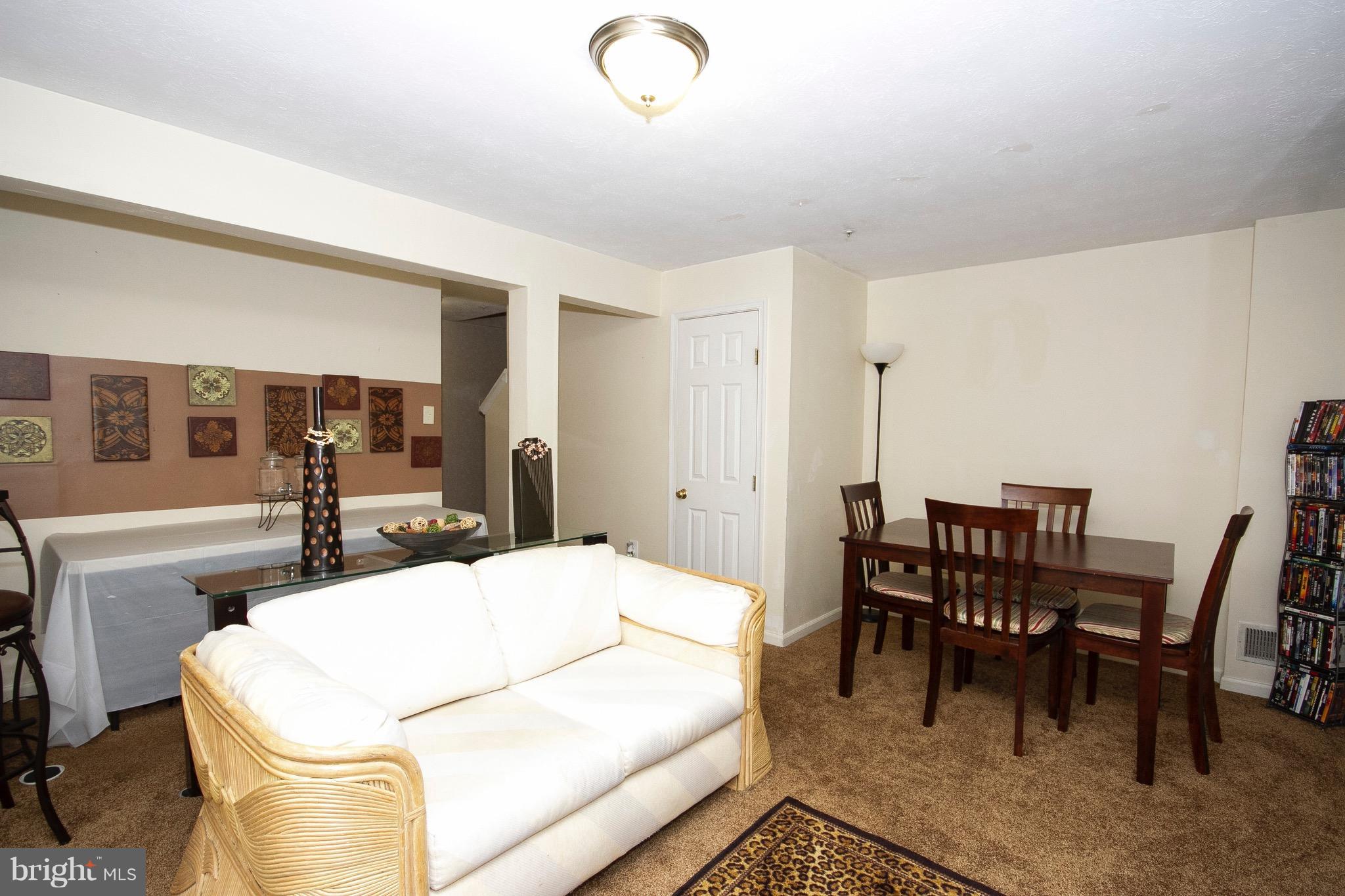 4201 Red Haven Road Baltimore, MD 21208 - Photo 22 of 29 a dining room with furniture and window