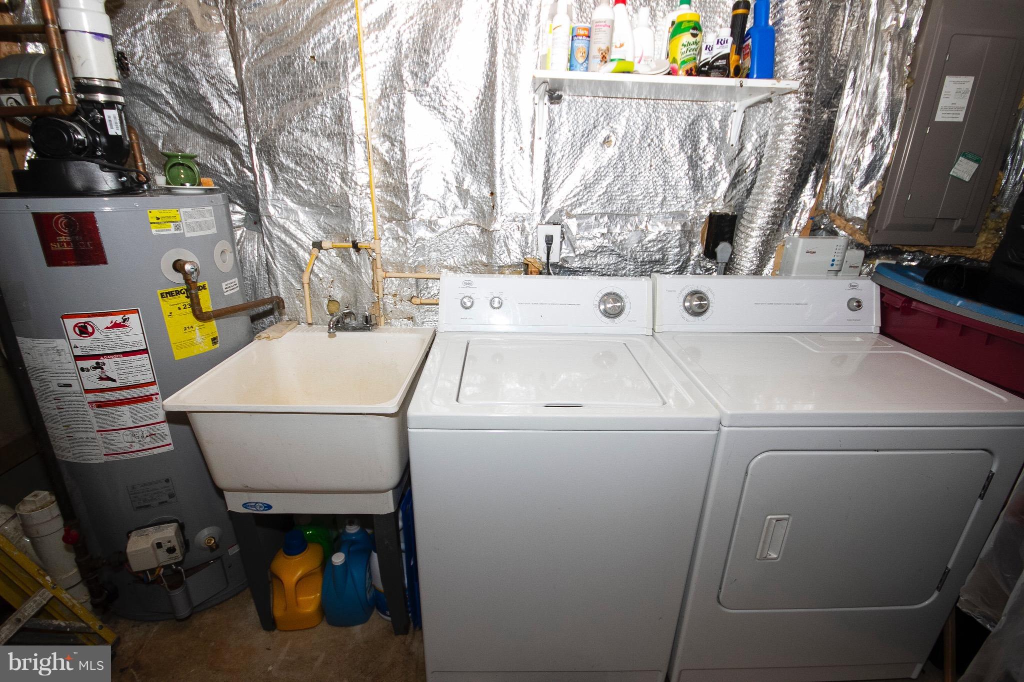 4201 Red Haven Road Baltimore, MD 21208 - Photo 25 of 29 a utility room with dryer and washer