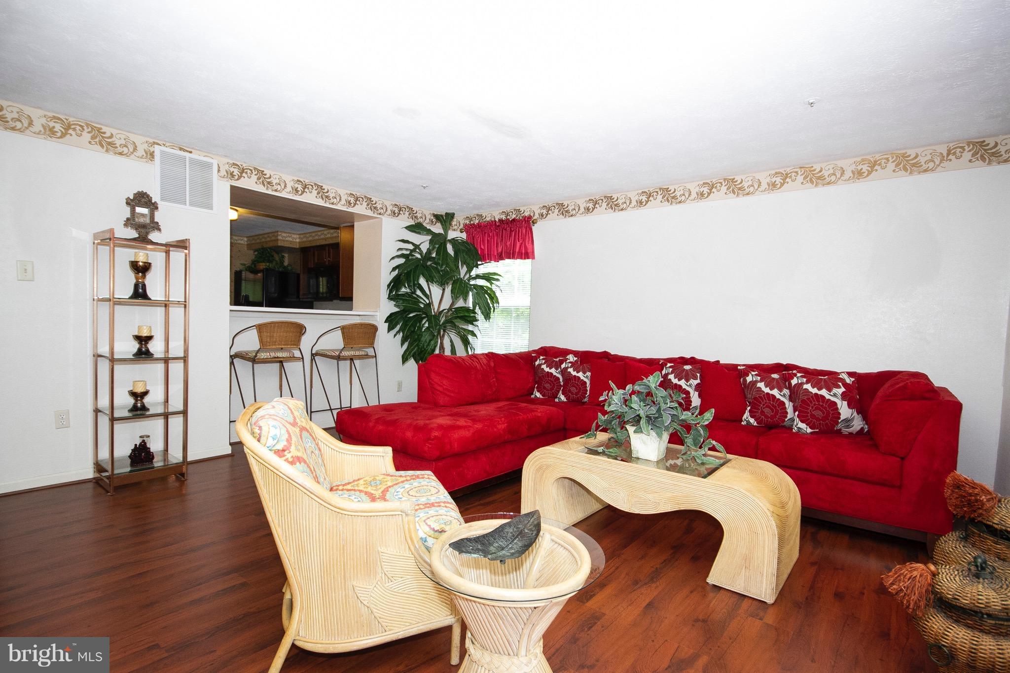 4201 Red Haven Road Baltimore, MD 21208 - Photo 4 of 29 a living room with furniture and a flat screen tv