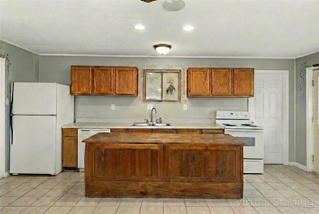 2250 Dillard Road Washington, TX 77880 - Photo 42 of 50 Kitchen in barn apartment *this photo has been edited to remove contents using AI
