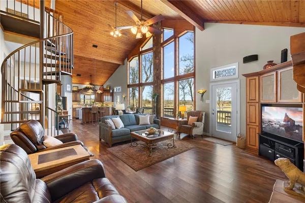 a kitchen with stainless steel appliances granite countertop a stove top oven a sink and dishwasher