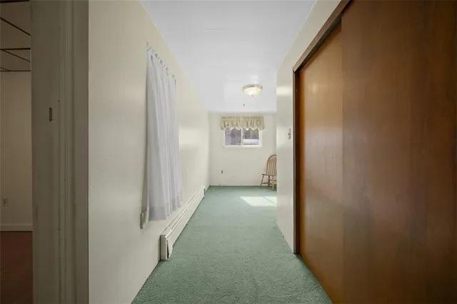 a view of room with window and workspace