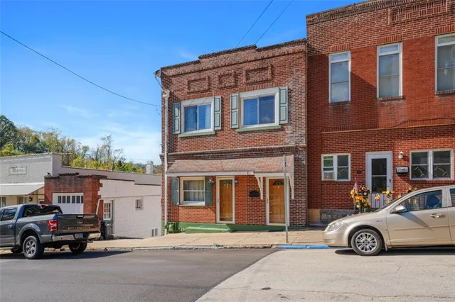a car parked in front of a building