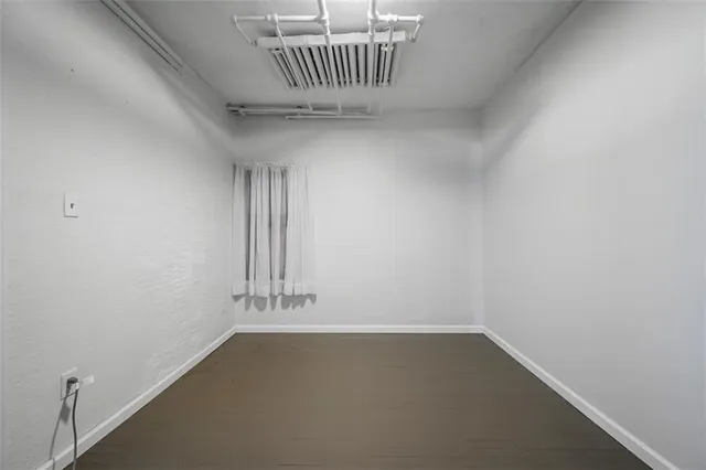 a view of a house with a street