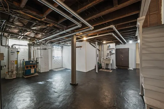 a view of a big yard with large trees