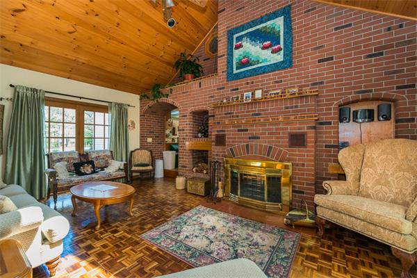 53 Baker Road Salisbury, MA 01952 - Photo 16 of 25 a living room with furniture and a fireplace