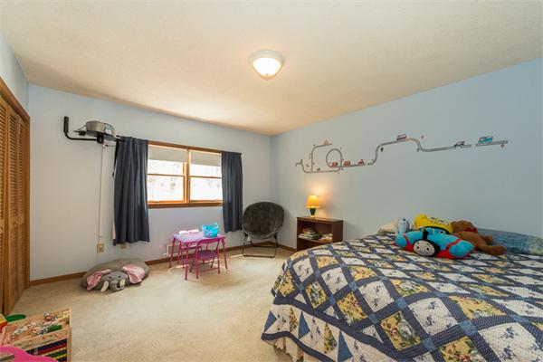 53 Baker Road Salisbury, MA 01952 - Photo 21 of 25 a bedroom with furniture and a window