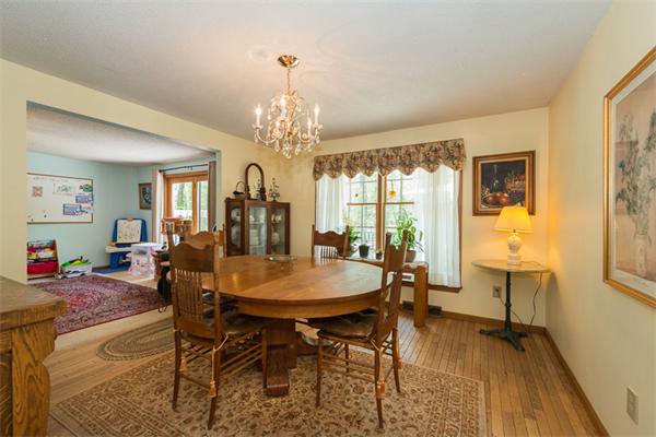 53 Baker Road Salisbury, MA 01952 - Photo 7 of 25 a view of a dining room with furniture and wooden floor
